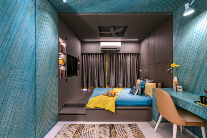intérieur d'une chambre turquoise-marron