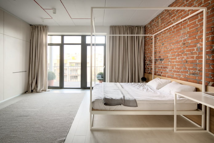 Chambre de style industriel avec des éléments minimalistes