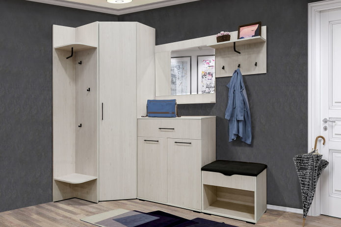 Intérieur d'un couloir avec une armoire d'angle en aggloméré stratifié