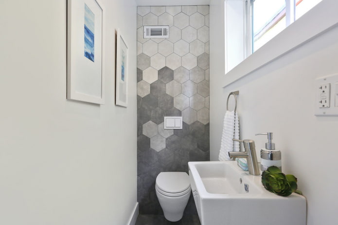 Carrelage nid d'abeille derrière les toilettes