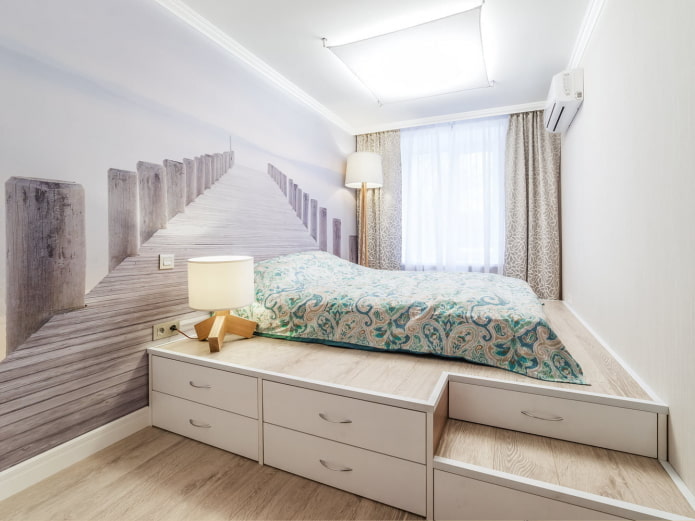 Podium avec tiroirs dans la chambre