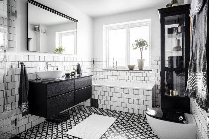 Meubles noirs dans la salle de bain