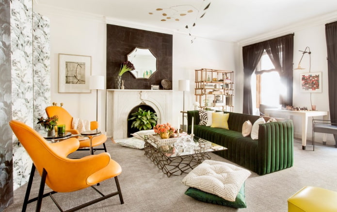 canapé vert associé à des fauteuils