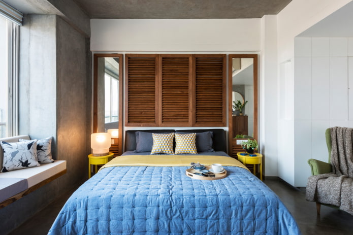 mirrors in brown frames in the bedroom interior