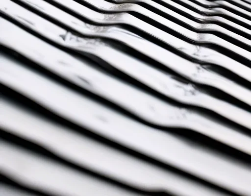 Système goutte à goutte pour tuiles métalliques : comment bien installer et organiser la toiture